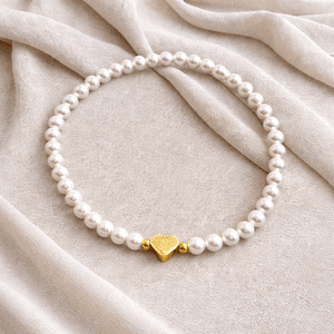 Hovedbilde Gullhjerte perlearmb&aring;nd